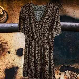 Kirundo M NWOT short sleeve viscose animal print lined bottom portion  dress